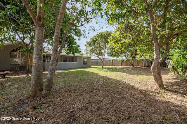 6010 Flamingo Ave, Cocoa, FL 32927 - view of yard featuring fence