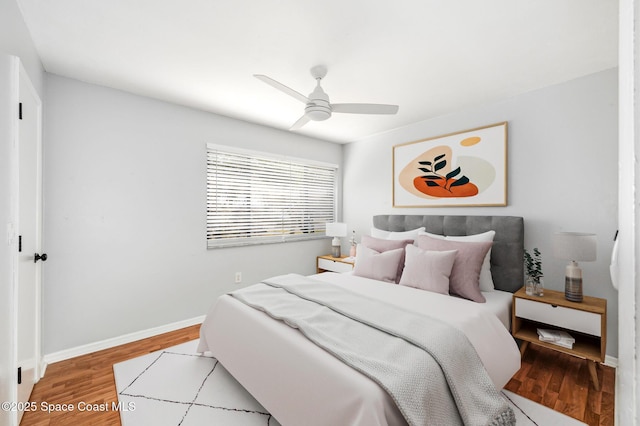 6010 Flamingo Ave, Cocoa, FL 32927 - bedroom featuring baseboards, a ceiling fan, and wood finished floors