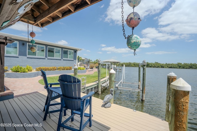 view of dock featuring a water view and boat lift