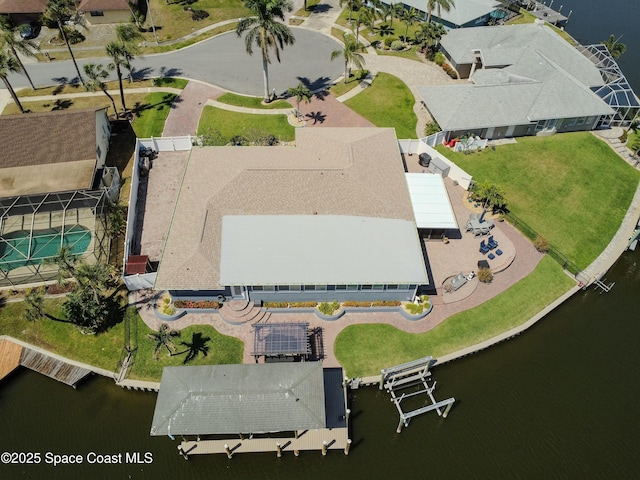 drone / aerial view with a water view
