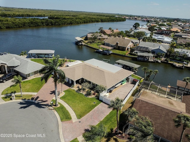 aerial view featuring a water view and a residential view