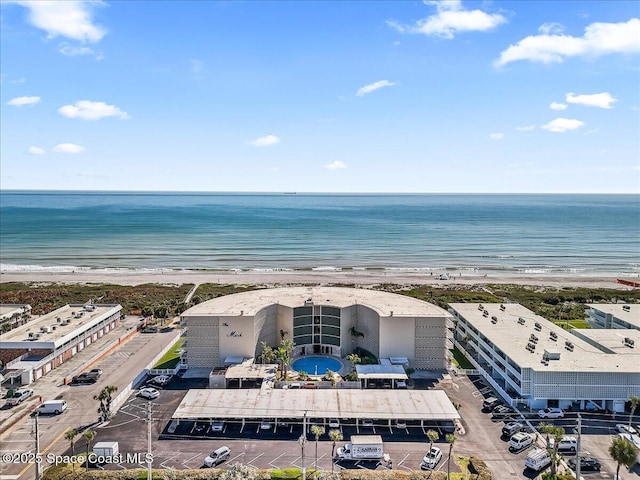 aerial view with a beach view and a water view
