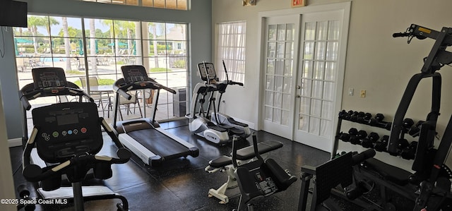 gym featuring baseboards