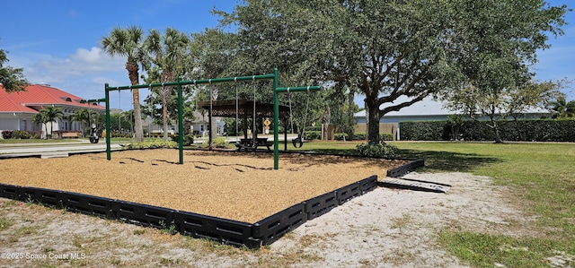 community playground featuring a yard