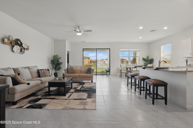 5358 Waterfall Pl, Grant, FL 32949 - living area featuring a ceiling fan, light tile patterned flooring, and recessed lighting