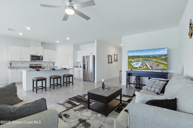 5358 Waterfall Pl, Grant, FL 32949 - living area with ceiling fan, recessed lighting, and baseboards