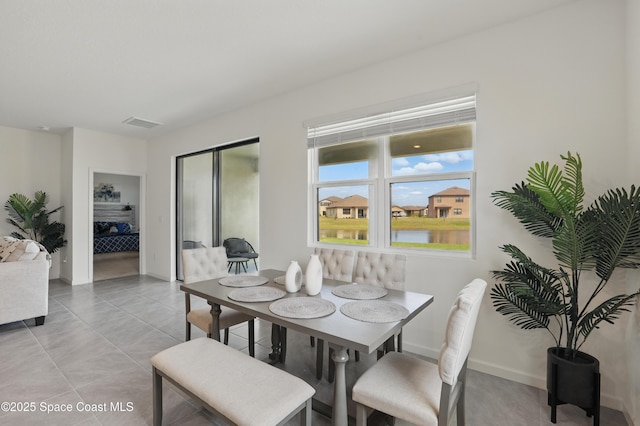 5358 Waterfall Pl, Grant, FL 32949 - dining area with baseboards