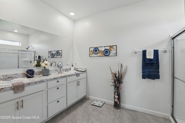 5358 Waterfall Pl, Grant, FL 32949 - full bathroom with a shower stall, double vanity, baseboards, tile patterned floors, and recessed lighting