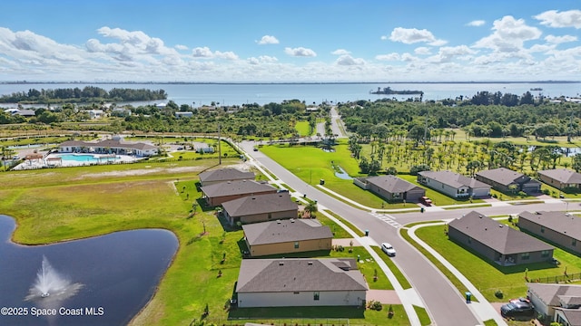 5358 Waterfall Pl, Grant, FL 32949 - aerial perspective of suburban area with a large body of water and a pool