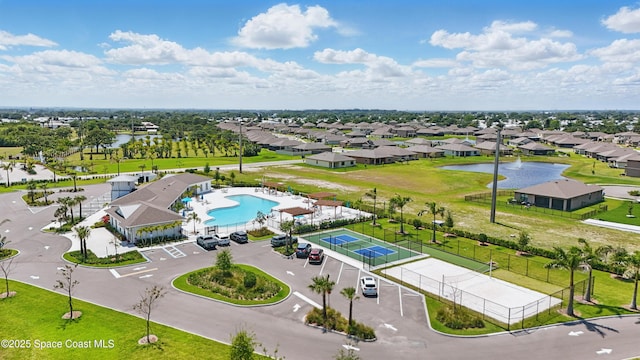 5358 Waterfall Pl, Grant, FL 32949 - aerial perspective of suburban area featuring a pool and a large body of water