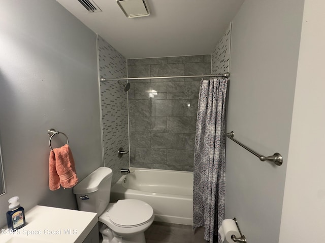 bathroom featuring shower / bath combination with curtain, toilet, vanity, and visible vents