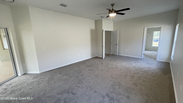 466 Stonehenge Cir, Rockledge, FL 32955 - unfurnished bedroom with baseboards, a ceiling fan, carpet, and visible vents