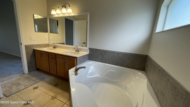 466 Stonehenge Cir, Rockledge, FL 32955 - bathroom with tile patterned flooring, a sink, a bath, and double vanity