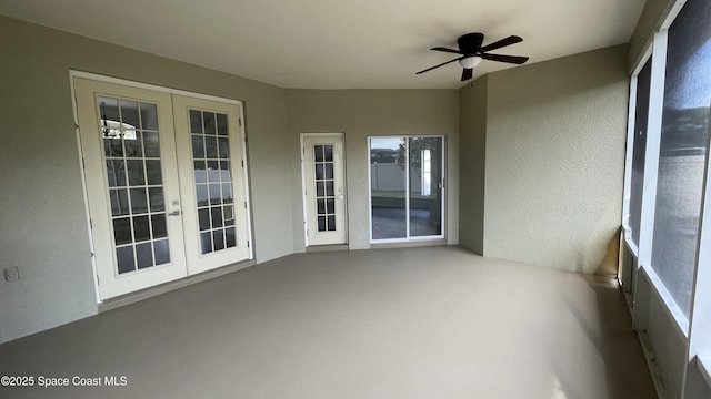 466 Stonehenge Cir, Rockledge, FL 32955 - unfurnished sunroom featuring french doors