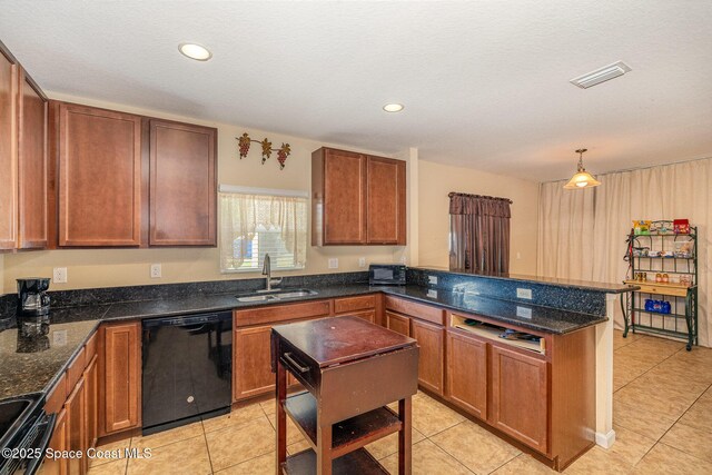kitchen featuring electric range, dishwasher, a sink, light tile patterned floors, and a peninsula