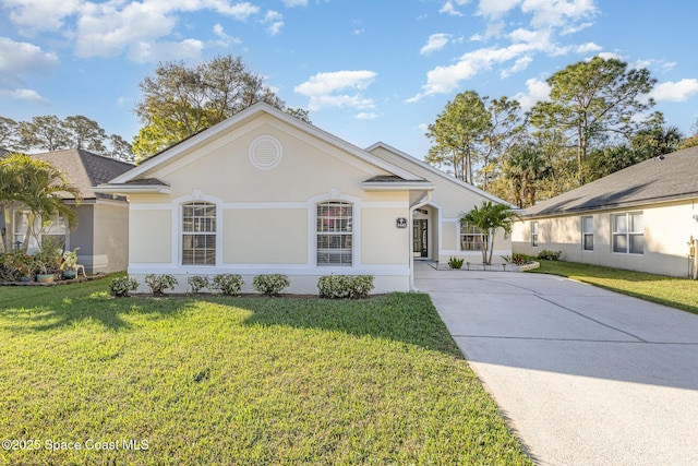 1461 Morgan Ct, Melbourne, FL 32934 - ranch-style house featuring stucco siding, a front lawn, and driveway