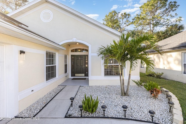1461 Morgan Ct, Melbourne, FL 32934 - property entrance with stucco siding