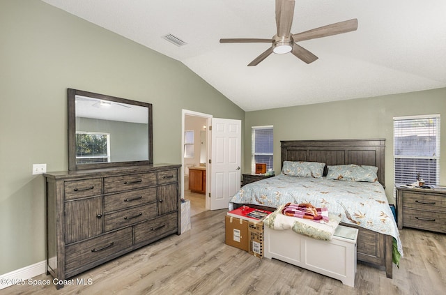 1461 Morgan Ct, Melbourne, FL 32934 - bedroom with multiple windows, vaulted ceiling, visible vents, and light wood-type flooring
