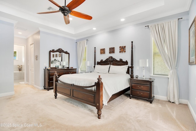 bedroom with light colored carpet, ornamental molding, recessed lighting, a raised ceiling, and baseboards