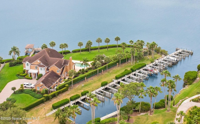 drone / aerial view featuring a water view