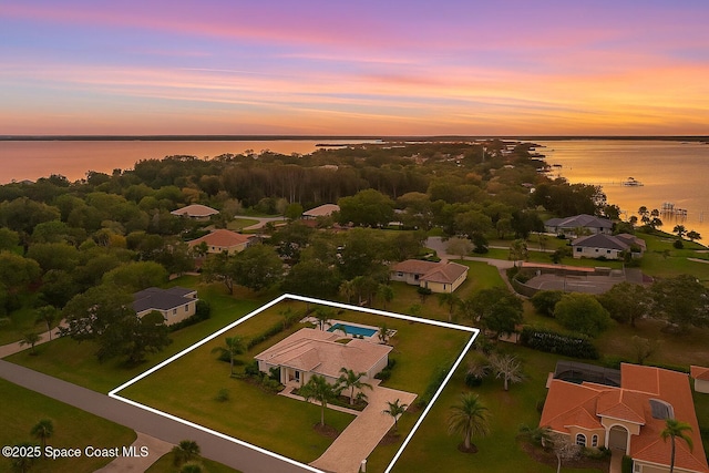 130 Utopia Cir, Merritt Island, FL 32952 - aerial view of property's location featuring a large body of water and property boundaries highlighted