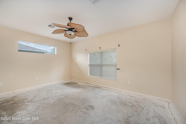 6921 Abbeyville Rd, Melbourne, FL 32940 - spare room with baseboards, visible vents, ceiling fan, and unfinished concrete flooring