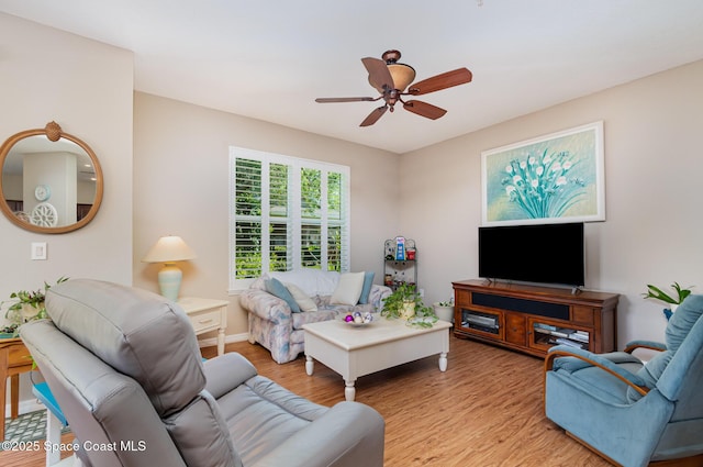 3321 San Jacinto Cir, Sanford, FL 32771 - living area featuring a ceiling fan, baseboards, and wood finished floors