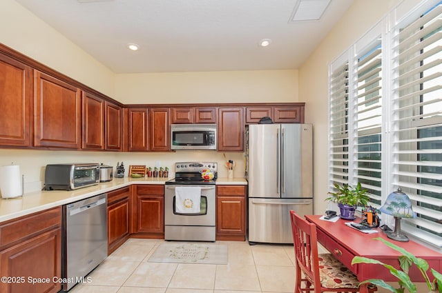 3321 San Jacinto Cir, Sanford, FL 32771 - kitchen with light countertops, appliances with stainless steel finishes, visible vents, and a toaster