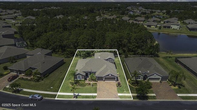 aerial view featuring a water view and a residential view