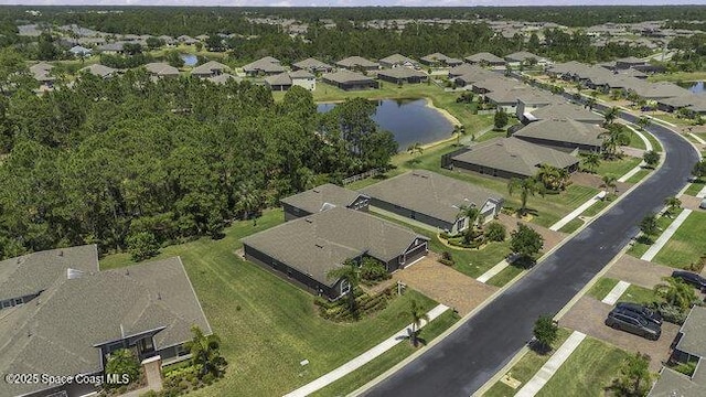aerial view with a water view and a residential view