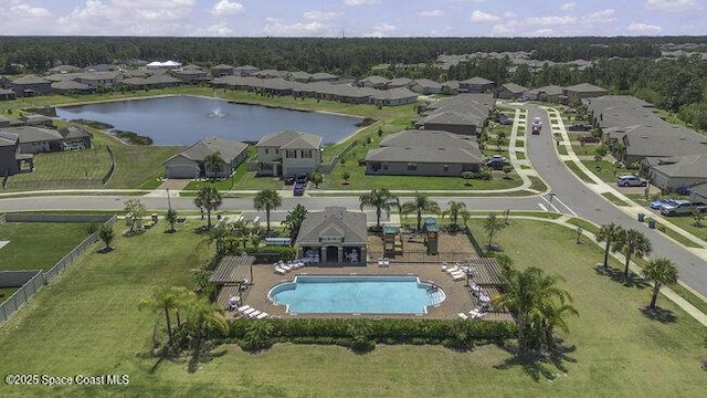 bird's eye view featuring a residential view and a water view
