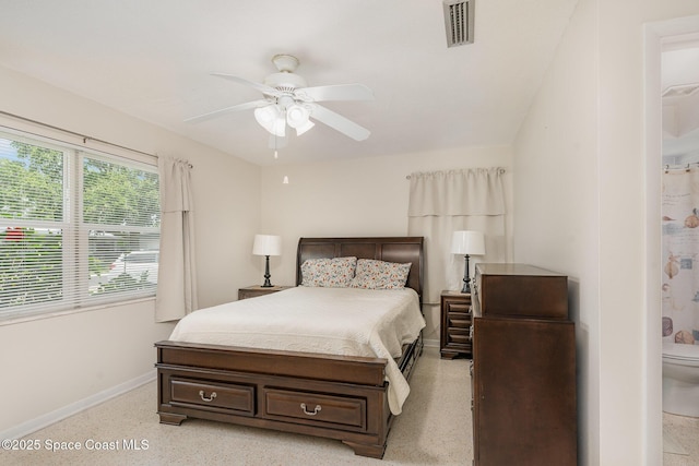 285 Hickory Ave, Merritt Island, FL 32953 - bedroom featuring baseboards, ceiling fan, and dark speckled floor