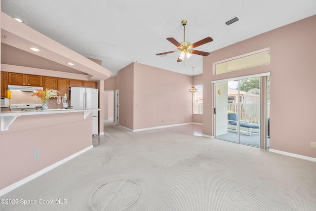 unfurnished living room featuring light carpet, baseboards, a ceiling fan, and recessed lighting