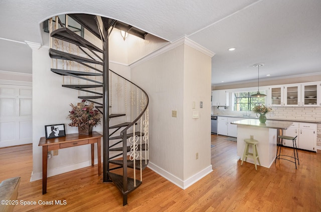 4320 Crooked Mile Rd, Merritt Island, FL 32952 - staircase featuring baseboards, ornamental molding, recessed lighting, and wood finished floors