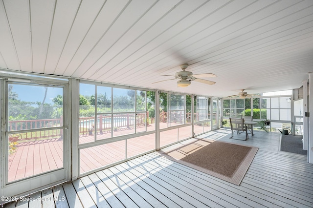 4320 Crooked Mile Rd, Merritt Island, FL 32952 - unfurnished sunroom featuring outdoor dining area, a ceiling fan, and plenty of natural light