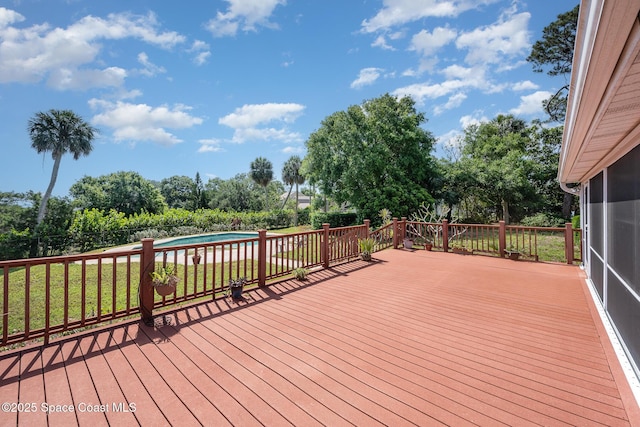 4320 Crooked Mile Rd, Merritt Island, FL 32952 - deck with a fenced in pool and a yard
