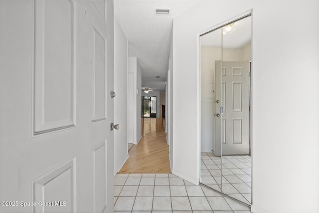 1909 S University Blvd Unit 302, Jacksonville, FL 32216 - hallway with light tile patterned floors