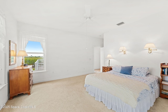 bedroom featuring baseboards, light carpet, a ceiling fan, and visible vents