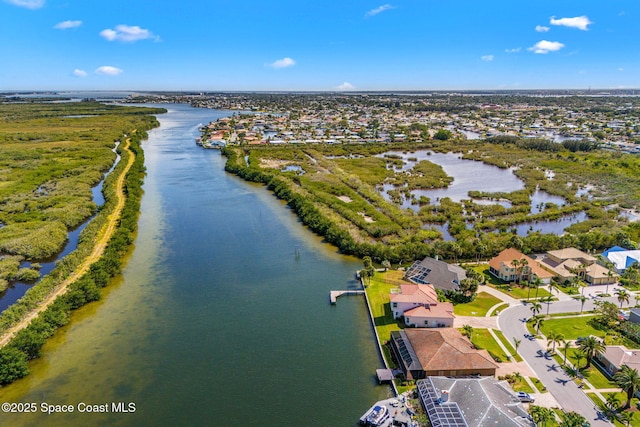 aerial view featuring a residential view and a water view