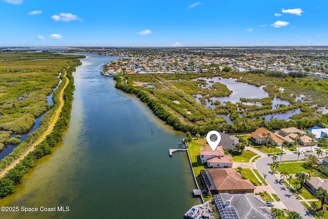 aerial view featuring a water view and a residential view