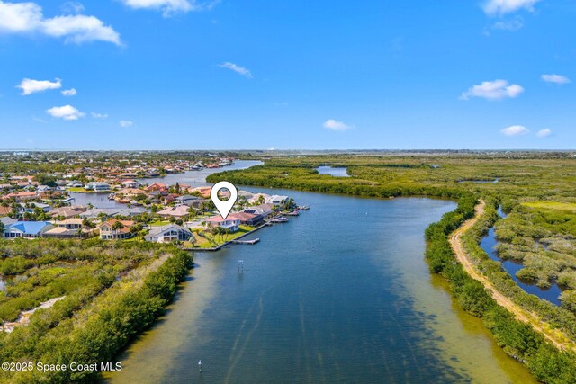 bird's eye view with a water view and a residential view