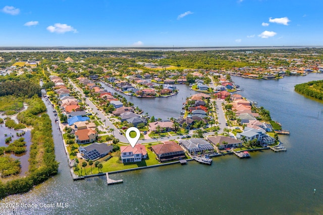 aerial view featuring a water view and a residential view
