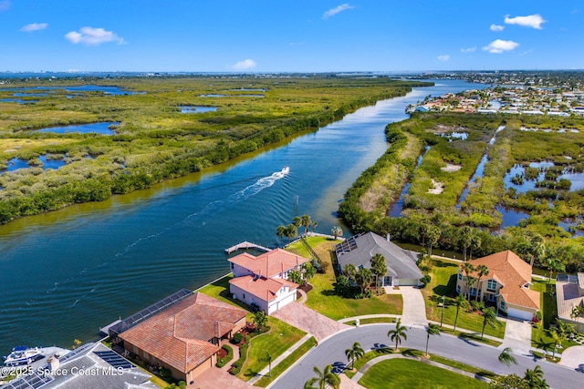 aerial view featuring a water view and a residential view