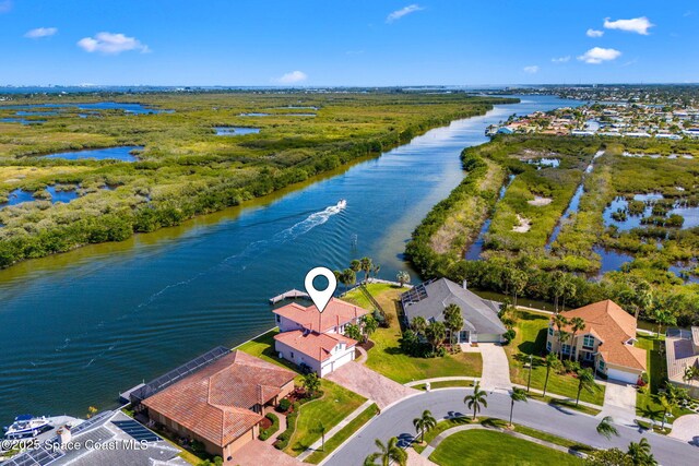 aerial view featuring a water view and a residential view