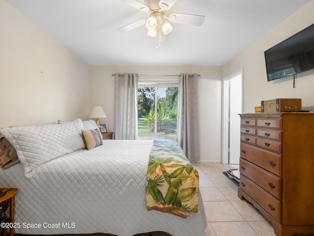 bedroom with light tile patterned floors and a ceiling fan