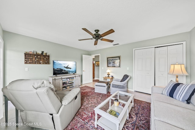 101 Joy Haven Dr, Sebastian, FL 32958 - living room featuring ceiling fan, baseboards, and visible vents