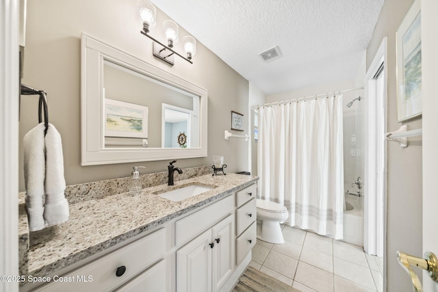 101 Joy Haven Dr, Sebastian, FL 32958 - full bath featuring vanity, toilet, visible vents, tile patterned flooring, and shower / tub combo with curtain