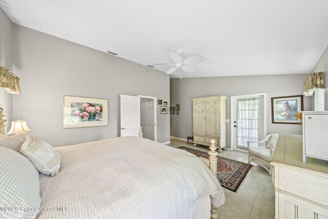 101 Joy Haven Dr, Sebastian, FL 32958 - bedroom with light tile patterned flooring, ceiling fan, visible vents, vaulted ceiling, and baseboards