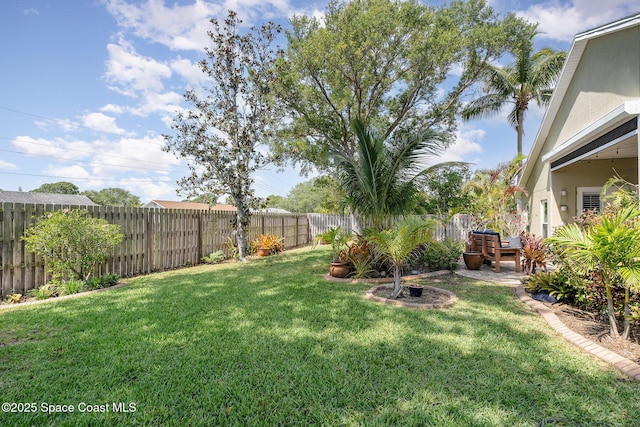 view of yard featuring a fenced backyard