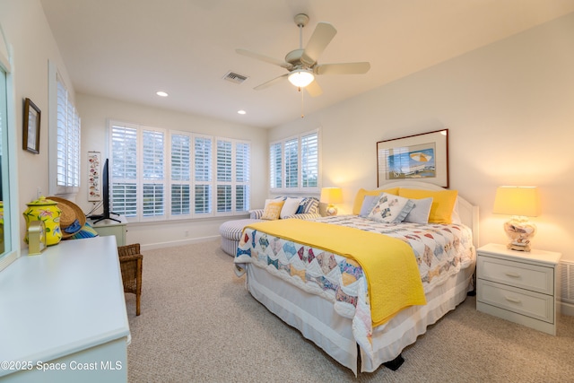 bedroom with recessed lighting, ceiling fan, visible vents, light carpet, and baseboards